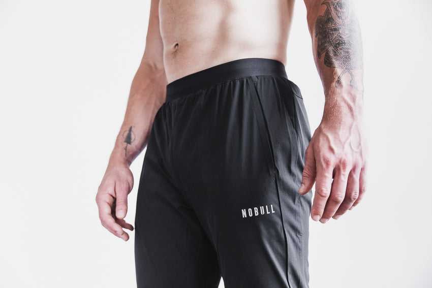 Nobull Lightweight Woven Track Pant Bottoms Black | 1738-NLXEO