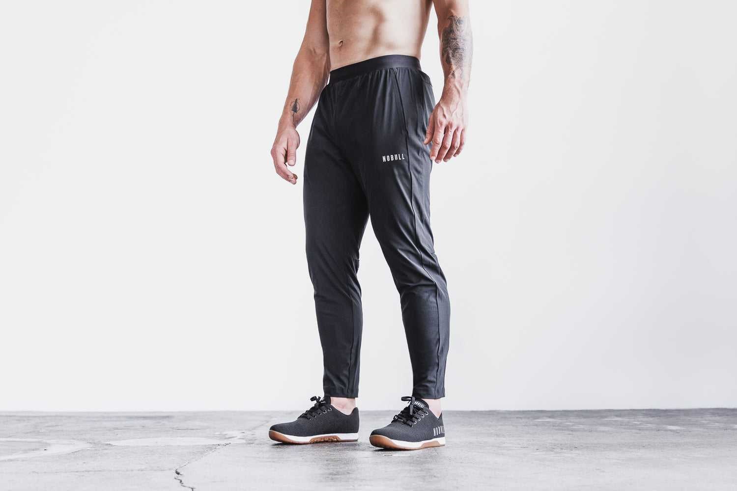 Nobull Lightweight Woven Track Pant Bottoms Black | 1738-NLXEO