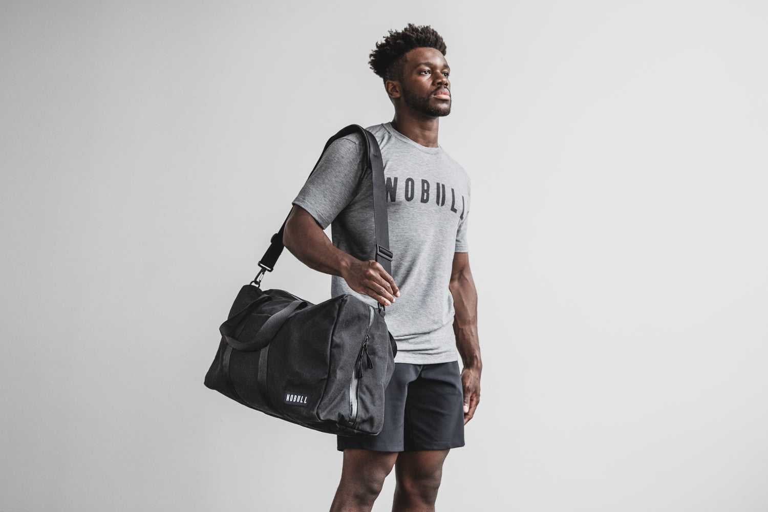 Nobull Waxed Canvas Duffle Bags Black | 1637-WOAPZ