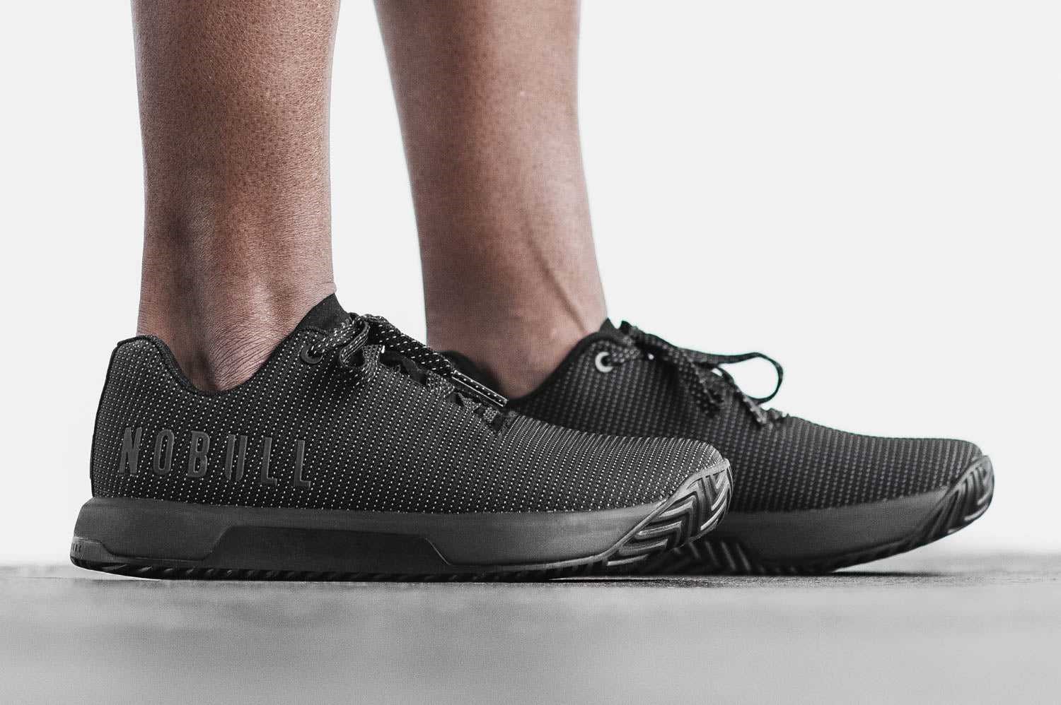 Nobull Woven Trainer+ Trainer+ Black Reflective | 5819-CTKPV